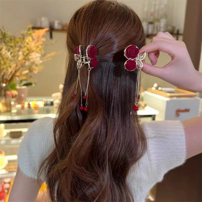 clip coda di cavallo pom pom rosa